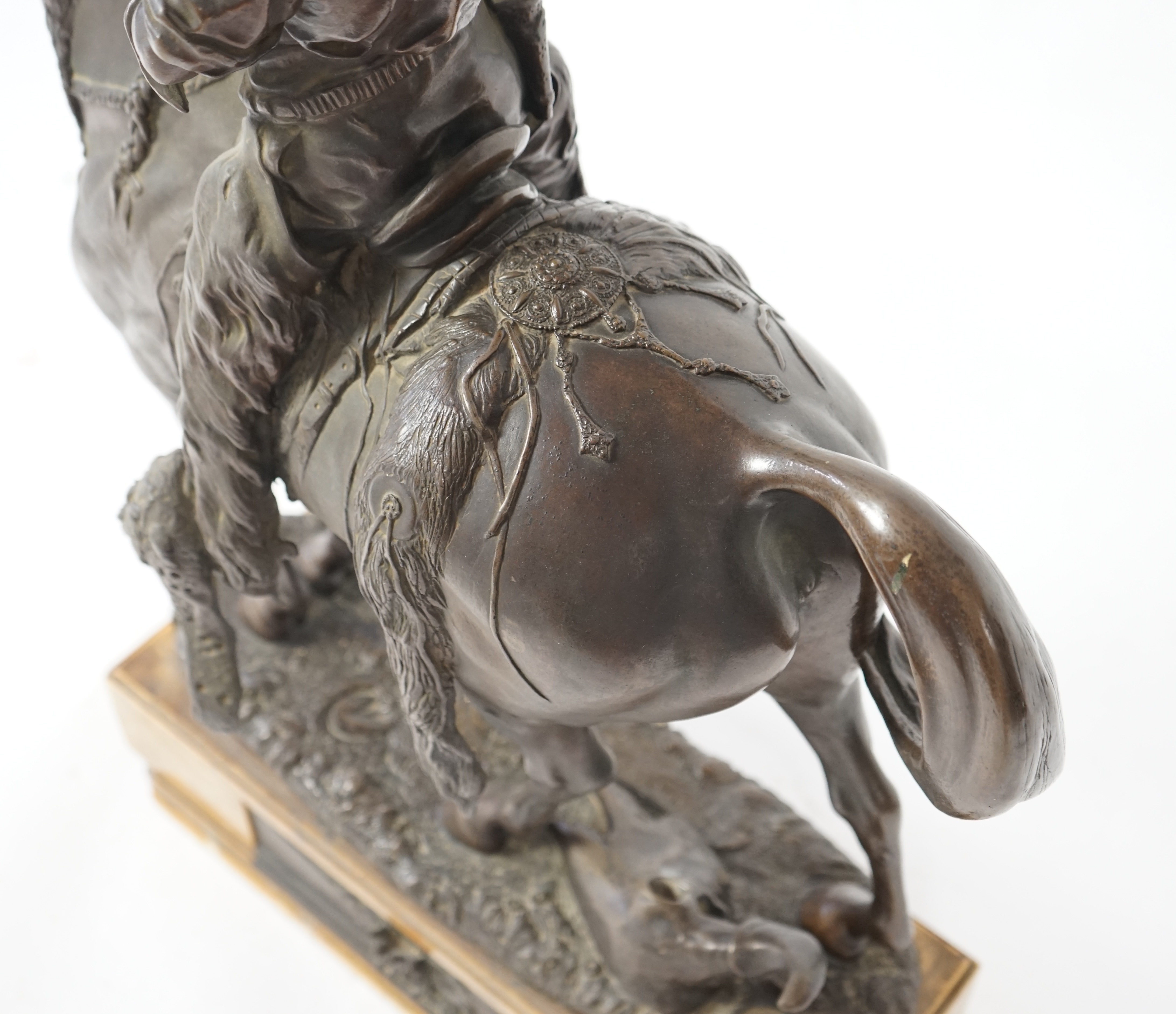 Walter Winans (St. Petersburg, 1852-Parsloe Park, Essex, 1920), a cast bronze of the artist, as a cowboy, riding the Arab stallion Skowronek, 50cm wide, 66cm high, overall 79.5cm high